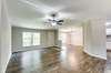 Living room opens to dining room and kitchen