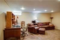 The basement has a finished room that is an excellent home office, rec room/flex space.