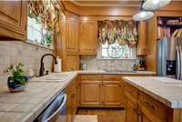 Kitchen with Stainless appliances and pantry