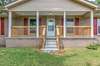 Enjoy the view on this newly installed covered front porch.