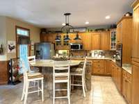 Kitchen with large Island that easily sits 4 people.