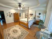 Primary Bedroom has a nice trey ceiling and a full Bath.