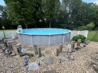 Above ground pool for cooling off.