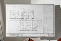 During the clean up of this home, the original plans from the architect Robinson Neil Bass were discovered. They have been reproduced and mounted for the new home owners.