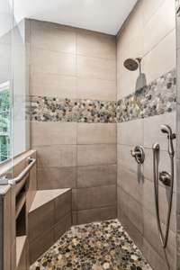 Floor to Ceiling Tiled Shower.