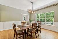 Impressive Formal Dining Room with Wainscoting.