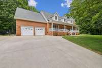 Concrete Driveway with large parking area completed in 2012. Sidewalks and Patio freshly sealed in 2024.