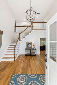 Grand 2 Story Foyer with an Abundance of Natural Light!