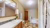 A large primary bathroom with a shower AND soaking tub.