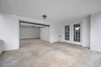 Covered patio area outside the automatic garage.