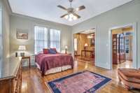 This room features two walls of windows for lots of natural light which creates a bright and airy atmosphere.