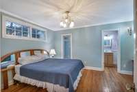 The bedroom suite has an attached full bath and walk-through closet.