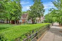 Proudly sitting on a 1/2 acre lot and having a guest home and two detached garages, it's a rare and exciting offering here.