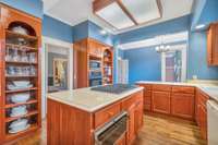 The build-in shelving units flanking the door to the dining room allows for beautiful displays.