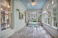 In addition to the sun room, there's a pleasant patio room on the home's western flank.