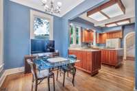 To the left of the kitchen is a spacious breakfast room.