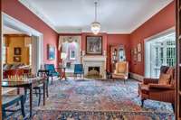 There are twin splendid parlors at the front of the home off the main hall.