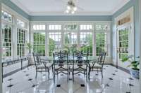 The front sun room is a light-filled delight.