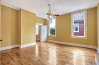 Notice the tall ceilings in the upstairs bedrooms as well!