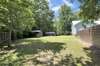 Back yard view shows privacy and buildings.