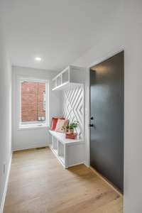 Mudroom located at the entry of the garage.