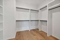 Ex-Large primary closet filled with custom storage.