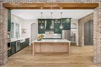 Looking in from the living area into the kitchen, you see all of the arched doorways, the brick walls, the wooden beam & the custom cabinets are like no other!