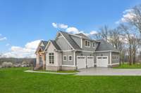 Right side view of the home.  *Green grass was edited for MLS purposes - this is an active construction site & landscaping has yet to be completed.