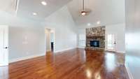 Another view of the oversized living room area.  Primary bedroom located just off this room (entry seen in pic).