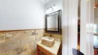 Powder room/half bath off foyer