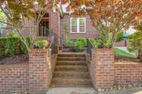 Brick entry way welcomes your guests to this spacious and entertaining home.