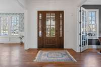 Warm and inviting front door and so many windows for natural light