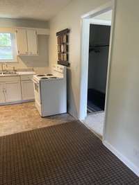 Living Room opens to Kitchen.  Open floor plan.