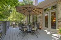 3 sets of double French doors open from the family room onto the back deck.