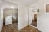 Laundry room, mudroom off of the kitchen with exterior door to the back