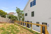 The urban patio provides generous space for outdoor gatherings between the home and detached garage. The first level includes a private pea graveled area while the second level offers a grassy area, perfect for your dog or a fire pit.