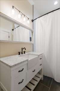 Bathroom with outdoor access perfect for pool days