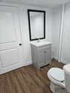 Bathroom accessible from Master Bedroom or from Laundry Room.