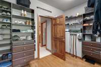 Primary closet with custom closets