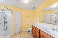 Full bath with stand up shower and linen closet