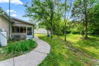 Lovely walkway to screened in porch