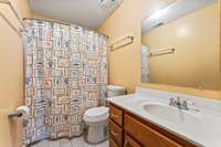 Full bathroom with combo tub/shower