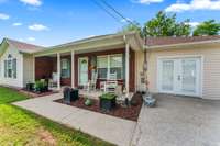 Inviting front porch and garage converted to bonus room