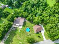 HUGE lot with above ground pool.