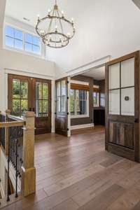 Two story foyer and entrance to Study