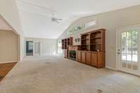 Living Room with Built In Bookcases and Fireplace