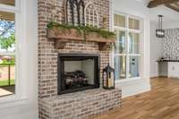 We love this real brick fireplace with the rustic mantle and corbels. It really adds a great accent to the room. The fireplace is on propane gas.