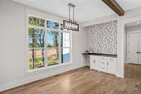 An additional view of the Dining area and the wet bar.