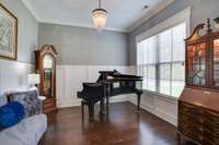 Music room/office/formal living/formal dining room. This room can be whatever you need it to me. Beautiful hardwoods and molding.