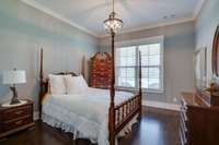 First floor guest bedroom. Beautiful hardwoods.